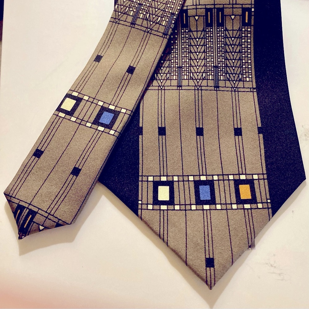 In the style of Frank Lloyd Wright, this tie features a versatile color palette.